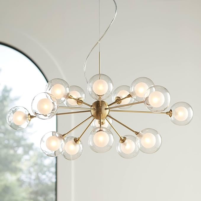 Possini Euro Design Glass Sphere Pendant ChandelierA stunning 15-light chandelier with frosted glass spheres, offering a sophisticated mid-century aesthetic.