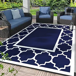 Waterproof outdoor rug made from foldable, reversible plastic straw material, ideal for patio decor, RV camping, decks, porches, picnics, beaches, and balconies.