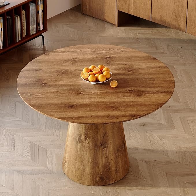 45" Round Rustic Dining Table – Mid-Century StyleWith a warm wood finish and stable base, this round dining table comfortably seats 4–6 while saving space. It brings timeless character and a cozy gathering vibe to any Moto Boho kitchen or apartment nook.